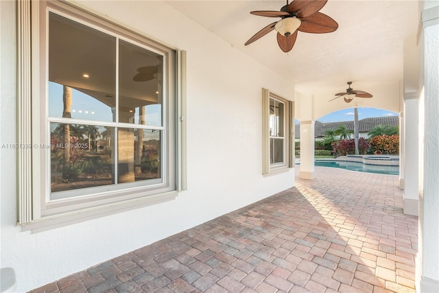 14403 S Jockey Cir S, Davie, FL 33330 - view of patio featuring a ceiling fan and an outdoor pool