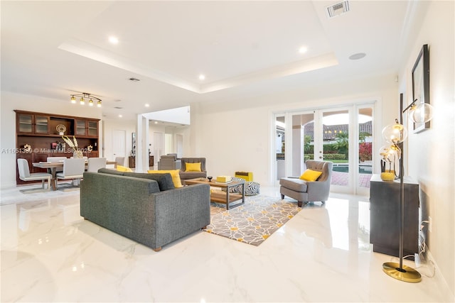 living room with recessed lighting, visible vents, marble finish floor, french doors, and a raised ceiling