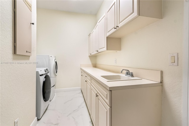14403 S Jockey Cir S, Davie, FL 33330 - laundry room with washer and dryer, light marble finish floors, and cabinet space