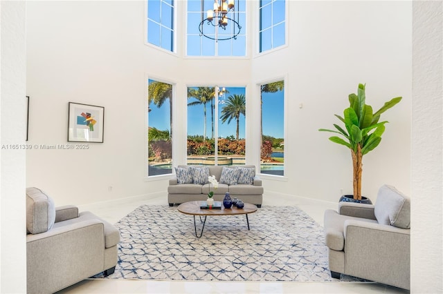 14403 S Jockey Cir S, Davie, FL 33330 - living area featuring a chandelier and a towering ceiling