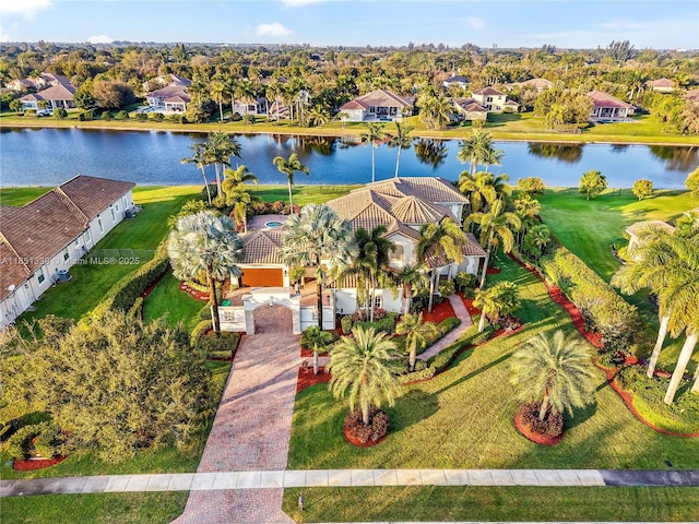 aerial view with a water view and a residential view