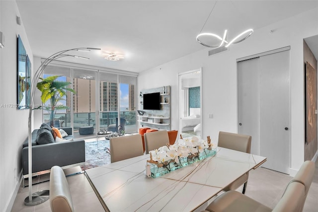 dining area featuring expansive windows