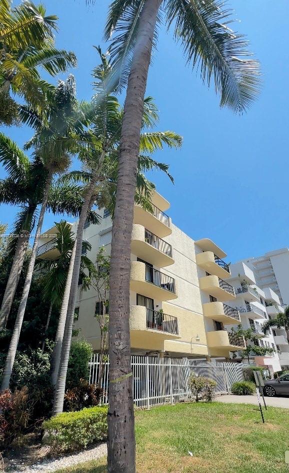 1673 Bay Rd Unit 405, Miami Beach, FL 33139 - view of property featuring fence