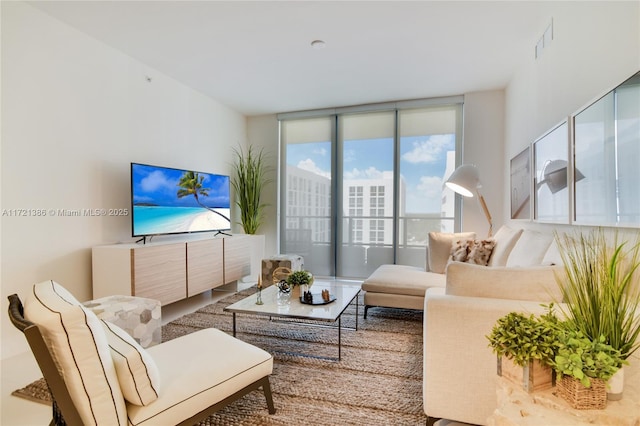 living room with floor to ceiling windows