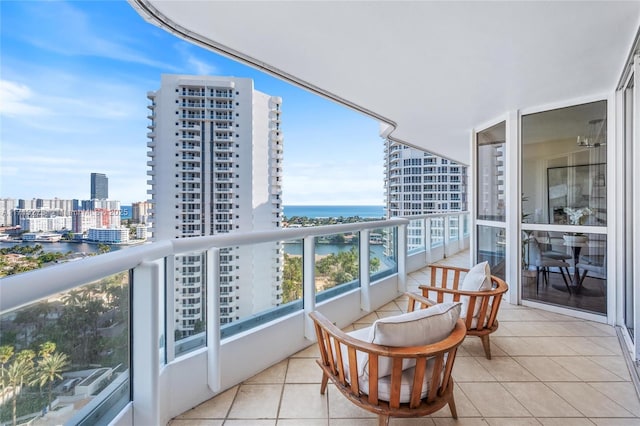 balcony featuring a water view