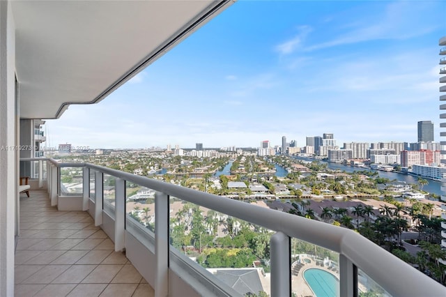 balcony featuring a water view