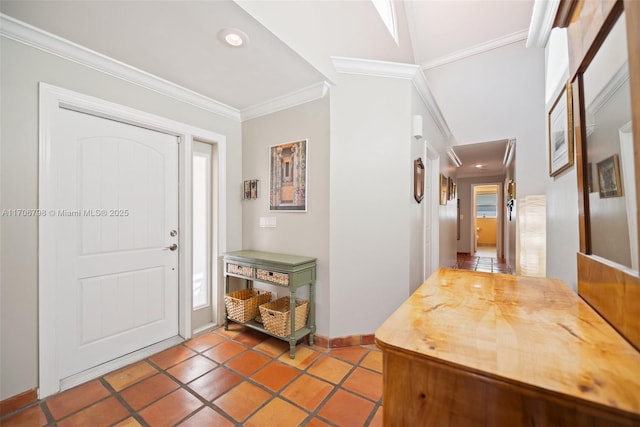 entrance foyer featuring crown molding and vaulted ceiling