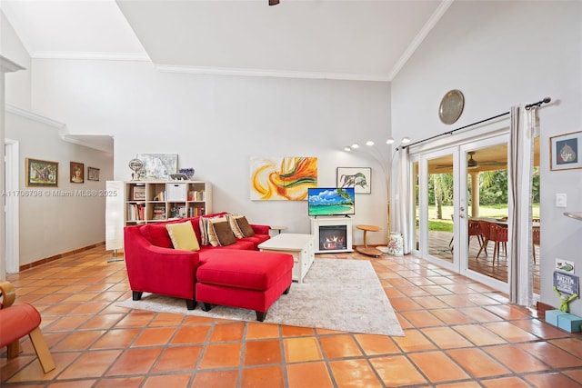 living room with tile patterned flooring, french doors, high vaulted ceiling, and ornamental molding