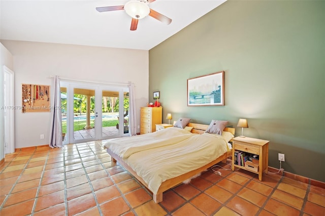 tiled bedroom with ceiling fan, access to exterior, and french doors