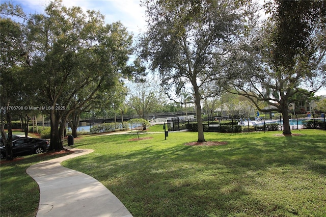 view of home's community featuring a lawn