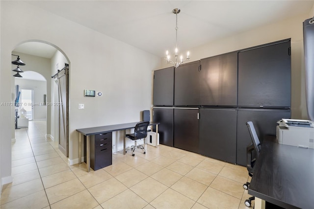 tiled office with a barn door and an inviting chandelier