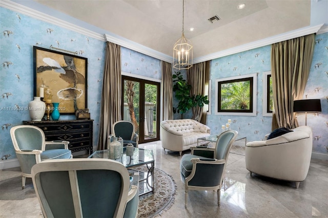 living area with a raised ceiling, french doors, an inviting chandelier, and ornamental molding