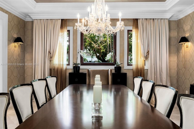 dining room with plenty of natural light, an inviting chandelier, and ornamental molding