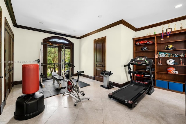 workout area featuring ornamental molding