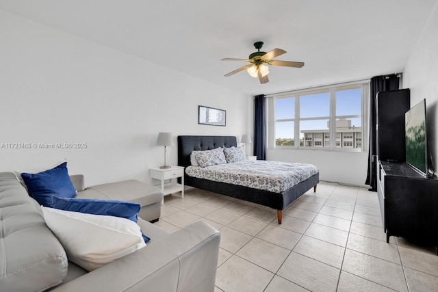 tiled bedroom with ceiling fan