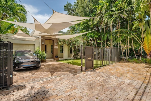 view of patio / terrace with a garage