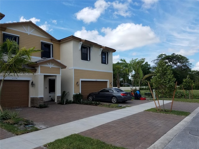 view of front of property with a garage