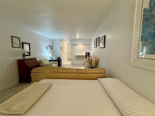 bedroom with light wood-type flooring