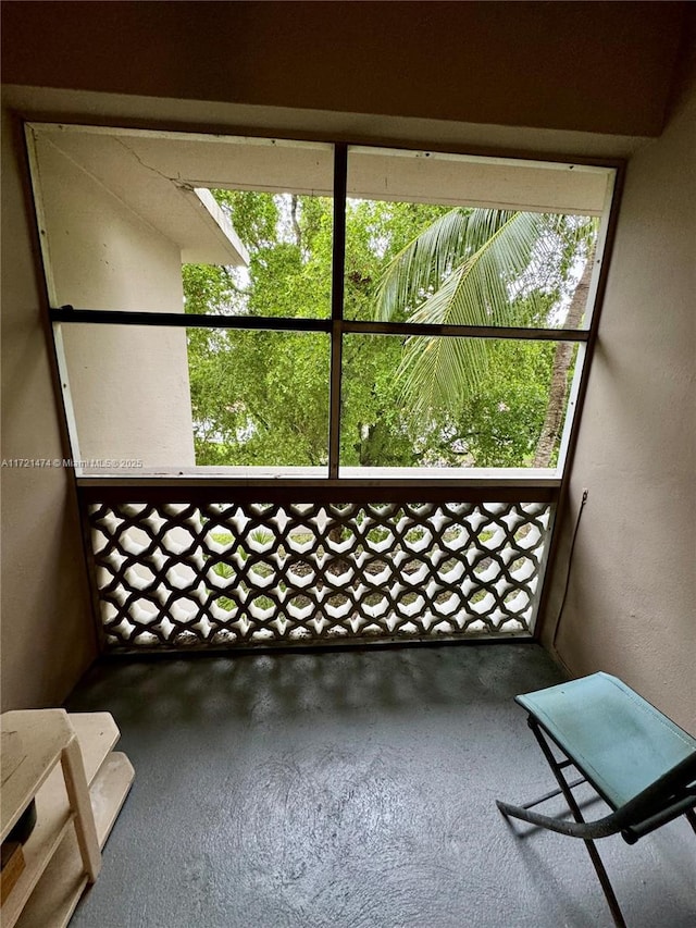 unfurnished sunroom with plenty of natural light