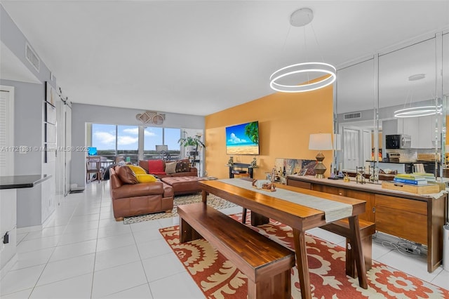 living room featuring light tile patterned floors