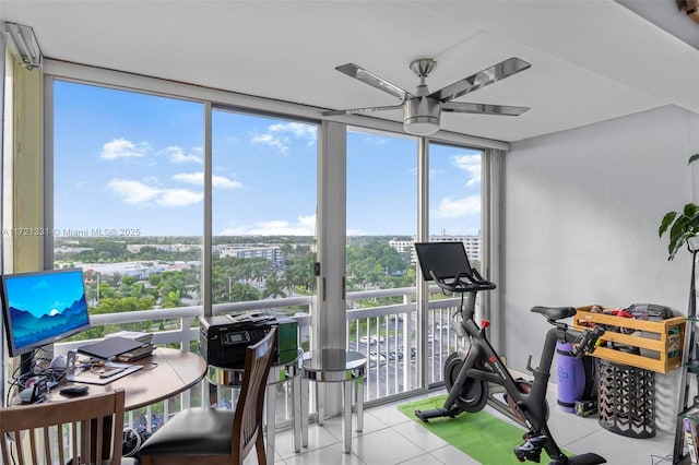 sunroom / solarium with ceiling fan