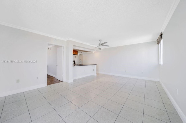 unfurnished living room featuring a textured ceiling, ceiling fan, light tile patterned flooring, and crown molding