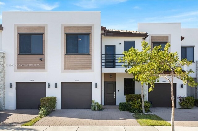 view of front of property with a garage