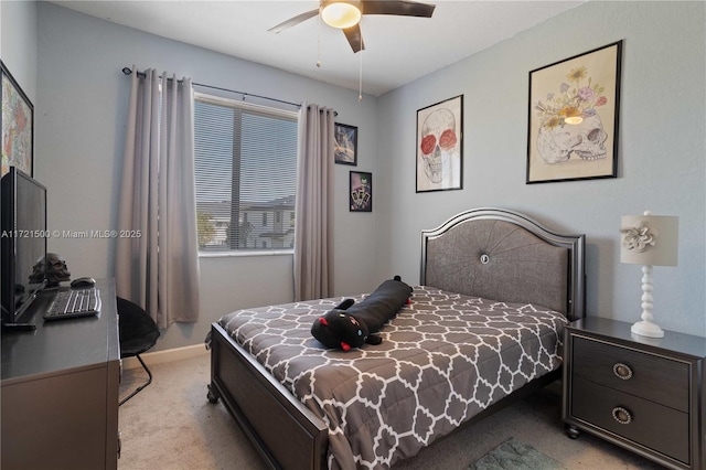 bedroom featuring light colored carpet, ceiling fan, and baseboards