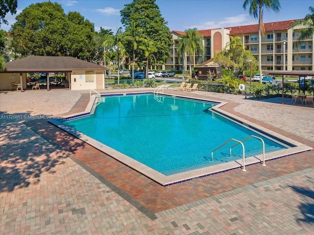 view of pool with a patio