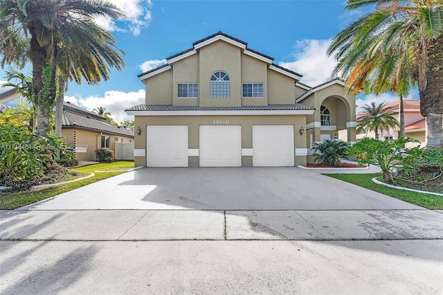 view of front of property with a garage