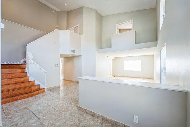 kitchen featuring a high ceiling