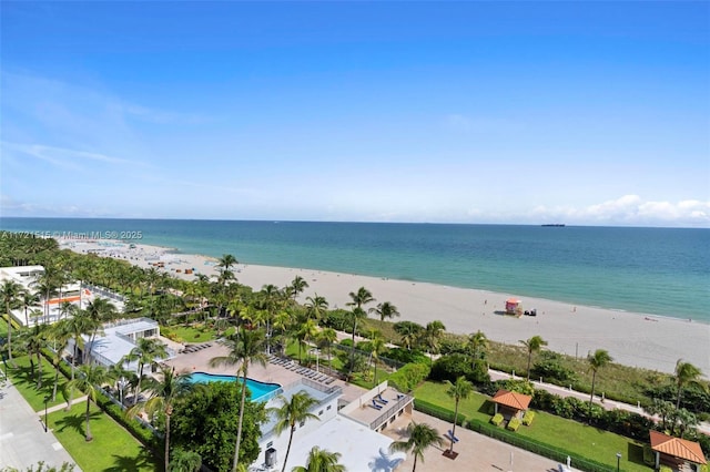 bird's eye view featuring a beach view and a water view