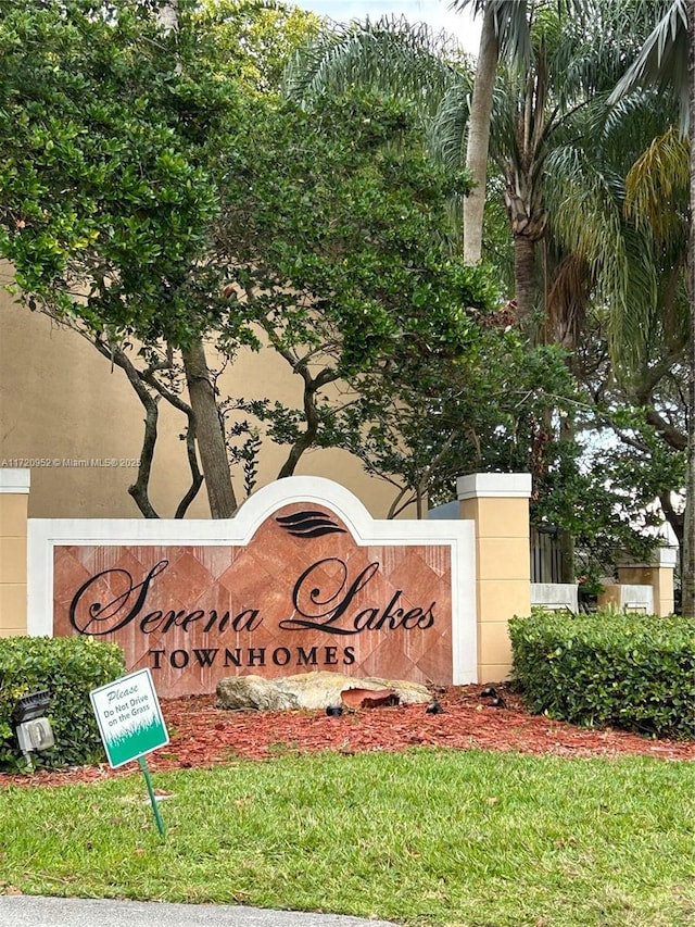 view of community sign