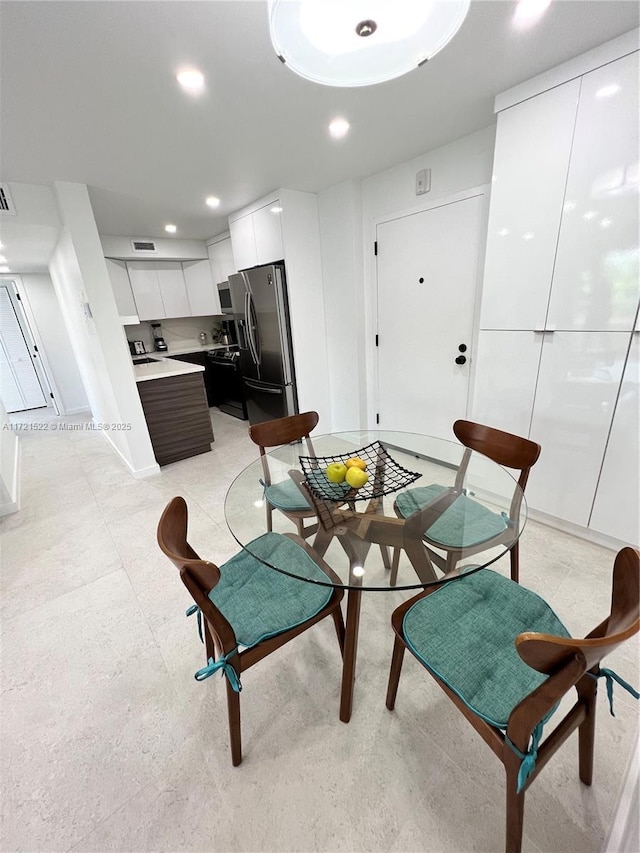 3304 Virginia St Unit 6B, Miami, FL 33133 - dining area featuring recessed lighting