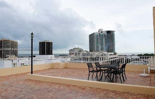 view of patio / terrace featuring a water view