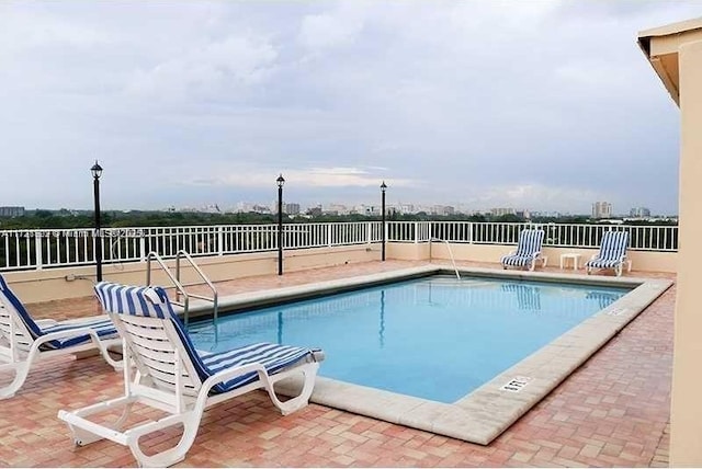 3304 Virginia St Unit 6B, Miami, FL 33133 - community pool featuring a patio