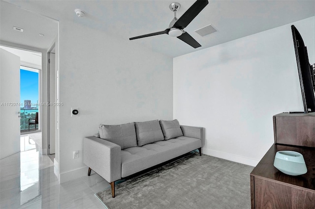 living room featuring ceiling fan