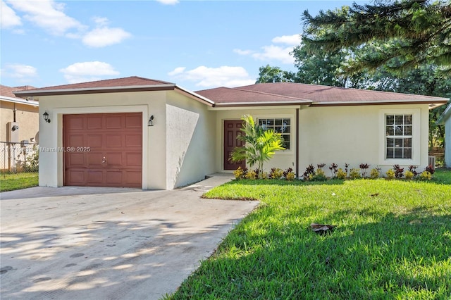 single story home featuring a garage and a front lawn