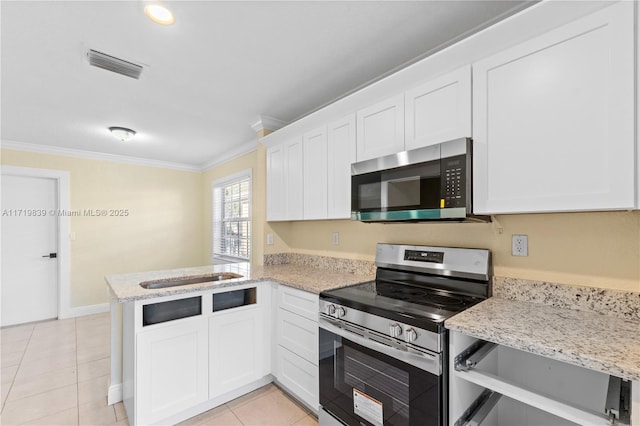 kitchen featuring kitchen peninsula, white cabinetry, stainless steel appliances, and ornamental molding