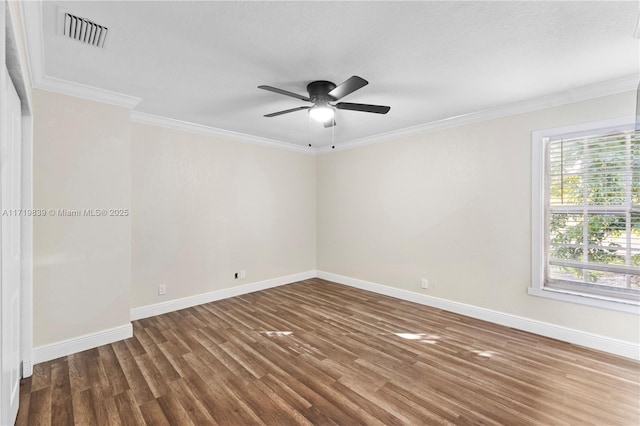 unfurnished room featuring ceiling fan, hardwood / wood-style flooring, and ornamental molding