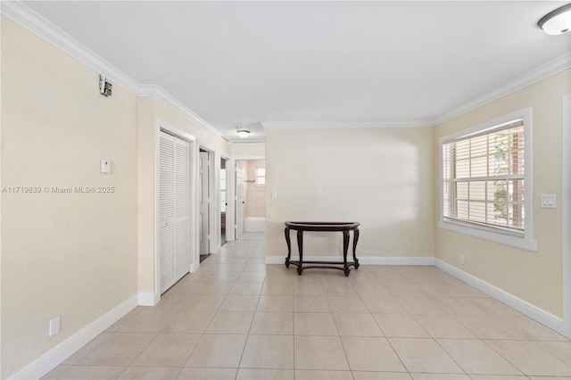 tiled empty room with crown molding