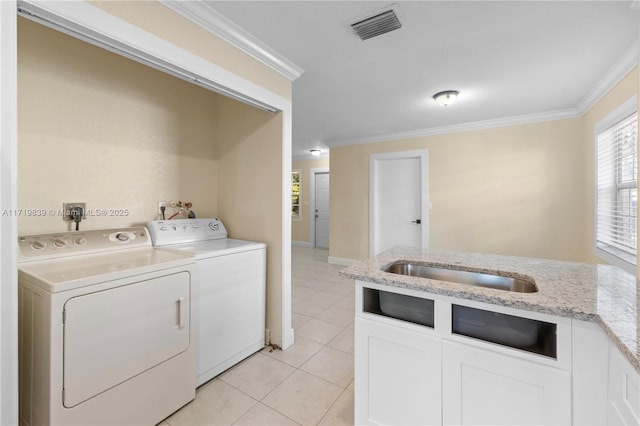 1574 NW 7th Ln, Pompano Beach, FL 33060 - washroom featuring ornamental molding, washer and dryer, and light tile patterned flooring