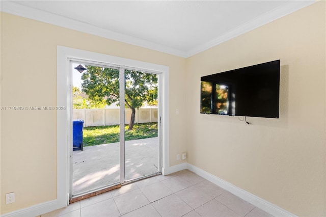 1574 NW 7th Ln, Pompano Beach, FL 33060 - empty room featuring ornamental molding and light tile patterned floors