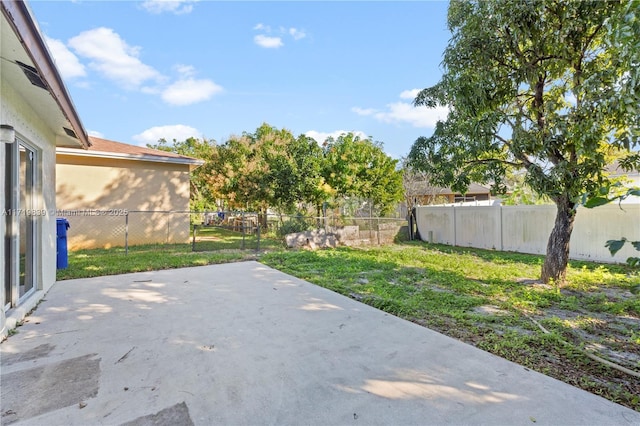 1574 NW 7th Ln, Pompano Beach, FL 33060 - fenced backyard featuring a patio