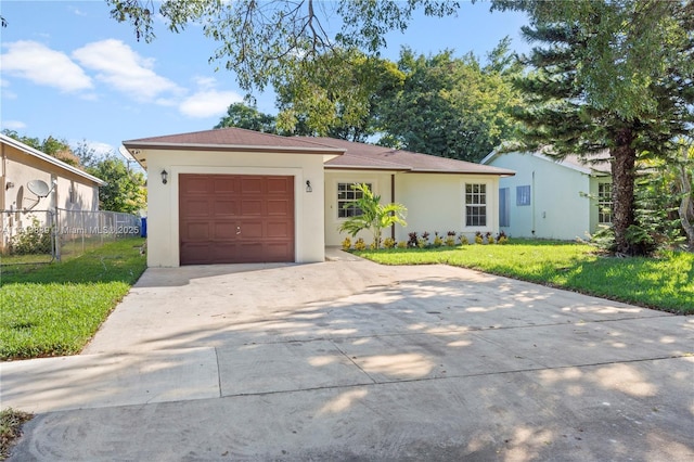 ranch-style house with a front yard and a garage