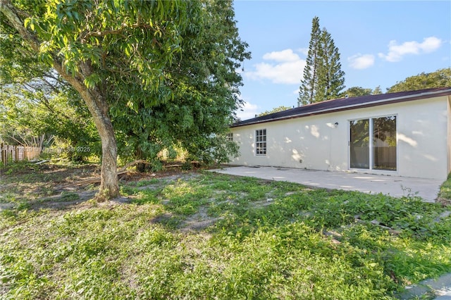 1574 NW 7th Ln, Pompano Beach, FL 33060 - view of yard featuring a patio area