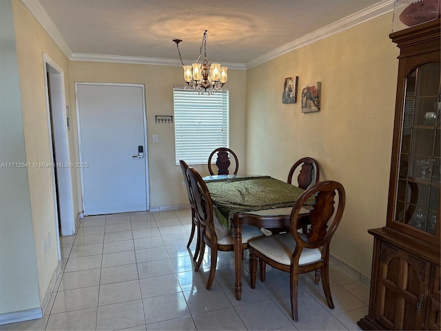 dining room featuring an inviting chandelier, crown molding, and light tile patterned flooring