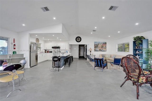 interior space featuring vaulted ceiling