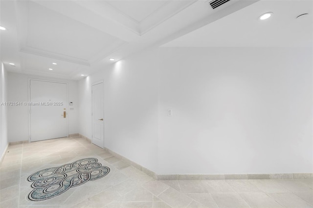 empty room featuring light tile patterned floors, beamed ceiling, and coffered ceiling