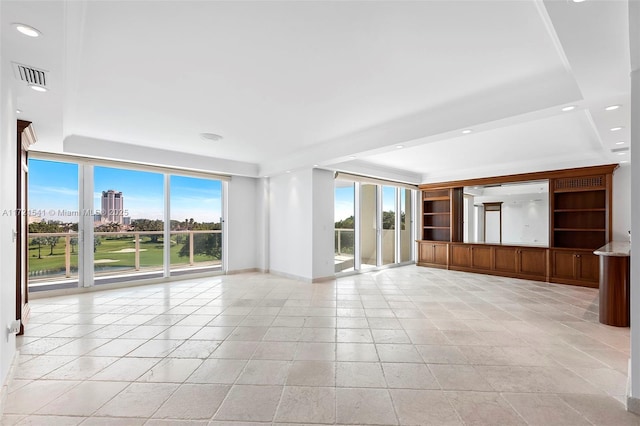 empty room with a tray ceiling